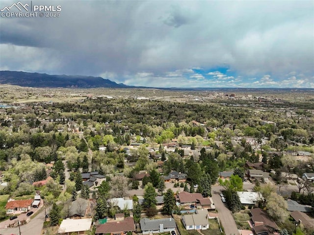 bird's eye view with a residential view and a mountain view