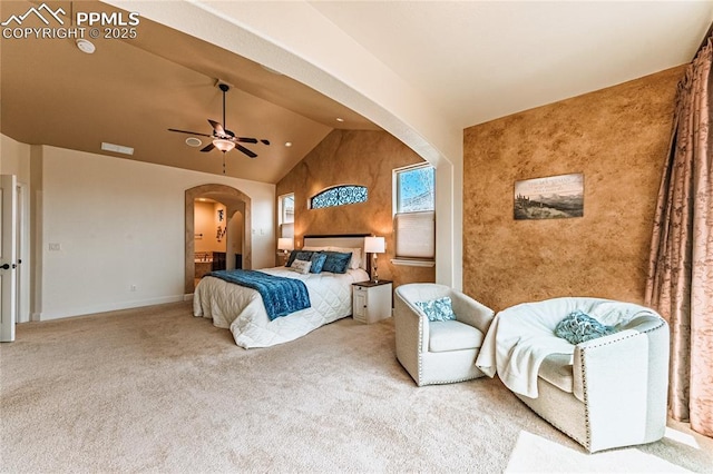 carpeted bedroom featuring arched walkways, recessed lighting, baseboards, ensuite bathroom, and vaulted ceiling