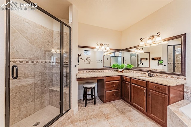 bathroom featuring vanity, a bathtub, and a shower stall