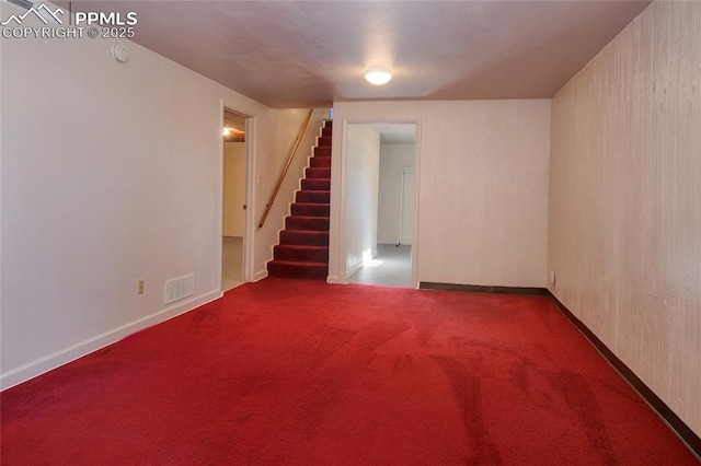 1227 Holmes Dr, Colorado Springs, CO 80909 - spare room with stairs, carpet flooring, a smoke detector, and baseboards