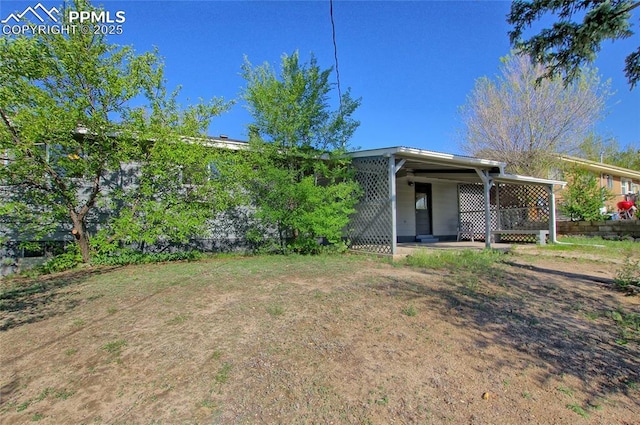 1227 Holmes Dr, Colorado Springs, CO 80909 - view of back of house