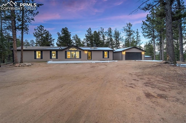 869 Kiowa Rd, Florissant, CO 80816 - single story home with a detached garage and an outbuilding