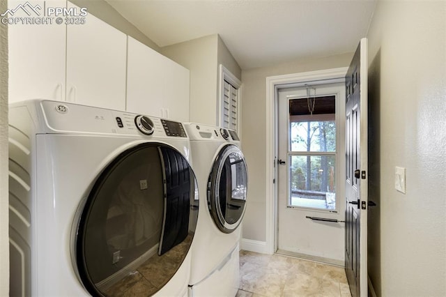 869 Kiowa Rd, Florissant, CO 80816 - clothes washing area featuring separate washer and dryer, cabinet space, and baseboards