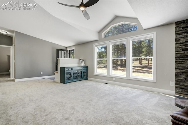 869 Kiowa Rd, Florissant, CO 80816 - unfurnished living room featuring lofted ceiling, ceiling fan, plenty of natural light, carpet flooring, and baseboards