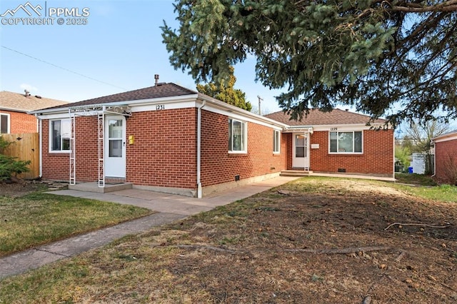 1229 E Caramillo St, Colorado Springs, CO 80909 - view of front facade with entry steps and brick siding