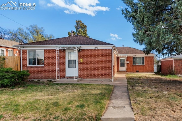 1229 E Caramillo St, Colorado Springs, CO 80909 - bungalow-style home featuring entry steps, brick siding, and roof with shingles