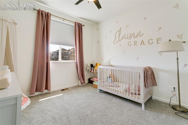 3111 Youngheart Way, Castle Rock, CO 80109 - carpeted bedroom with a nursery area, baseboards, and ceiling fan