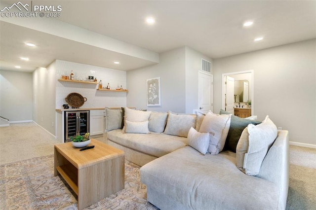 3111 Youngheart Way, Castle Rock, CO 80109 - living room with wine cooler, a bar, light carpet, baseboards, and recessed lighting