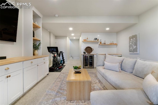 3111 Youngheart Way, Castle Rock, CO 80109 - living room with a bar, beverage cooler, light colored carpet, and recessed lighting
