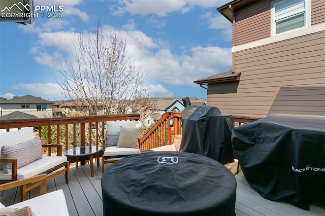 3111 Youngheart Way, Castle Rock, CO 80109 - wooden deck featuring area for grilling and a residential view