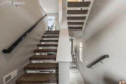 staircase with visible vents