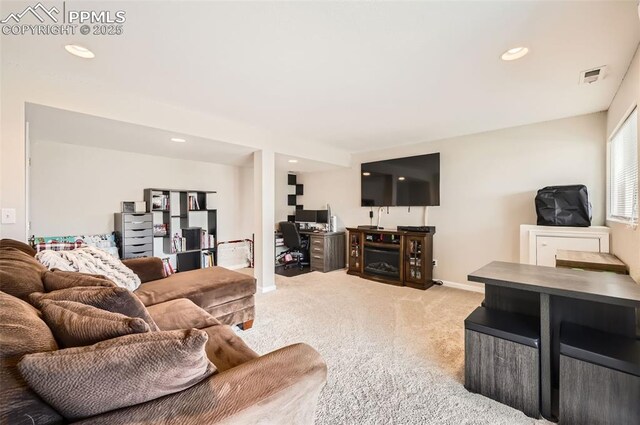 living room featuring light colored carpet, recessed lighting, baseboards, and visible vents