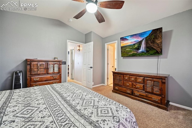 carpeted bedroom with a ceiling fan, baseboards, and vaulted ceiling