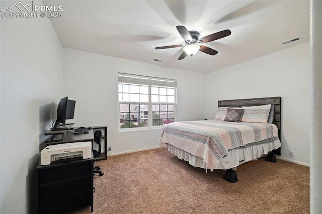bedroom featuring baseboards, carpet flooring, and visible vents