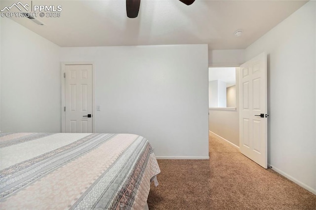 bedroom featuring baseboards, ceiling fan, and light colored carpet