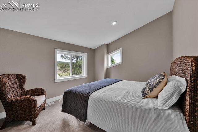 bedroom with carpet floors, recessed lighting, baseboards, and visible vents