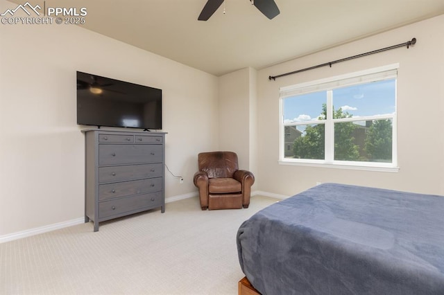 1849 Mud Hen Dr, Colorado Springs, CO 80921 - bedroom with baseboards, light carpet, and a ceiling fan