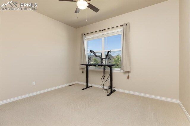 1849 Mud Hen Dr, Colorado Springs, CO 80921 - unfurnished room with light carpet, ceiling fan, and baseboards
