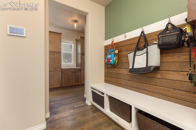 1849 Mud Hen Dr, Colorado Springs, CO 80921 - mudroom with dark wood-style flooring and baseboards