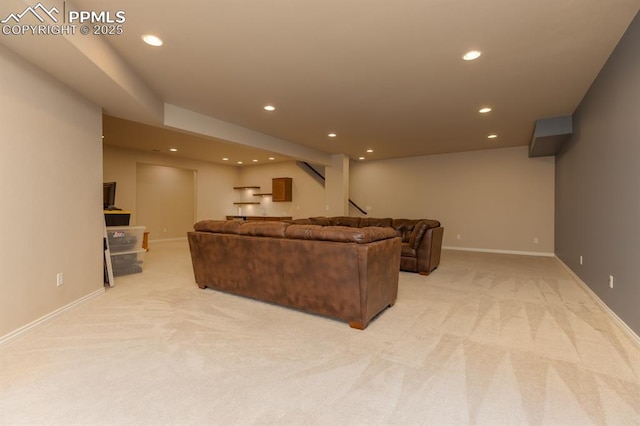 1849 Mud Hen Dr, Colorado Springs, CO 80921 - living area featuring light carpet, recessed lighting, stairway, and baseboards