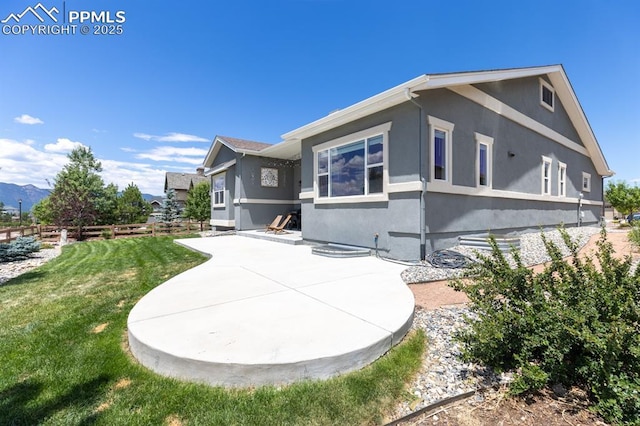 1849 Mud Hen Dr, Colorado Springs, CO 80921 - view of front of house featuring a patio and stucco siding