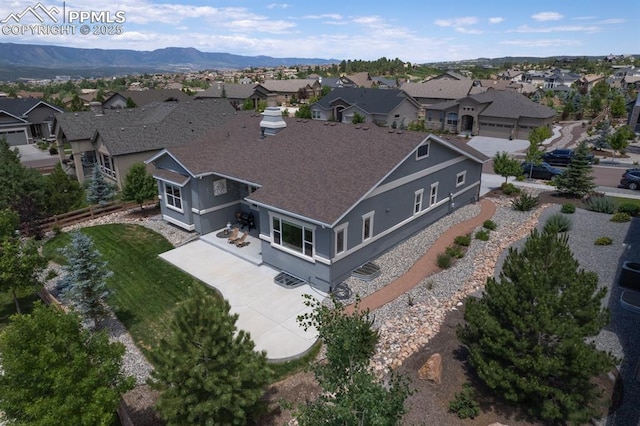 1849 Mud Hen Dr, Colorado Springs, CO 80921 - aerial perspective of suburban area with a mountain backdrop