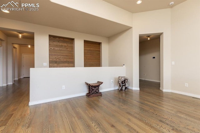 1849 Mud Hen Dr, Colorado Springs, CO 80921 - unfurnished room with wood finished floors, baseboards, recessed lighting, and a smoke detector