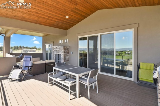 wooden deck with an outdoor living space and outdoor dining space