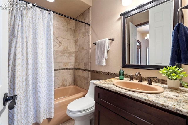 full bathroom featuring toilet, shower / bath combo, and vanity
