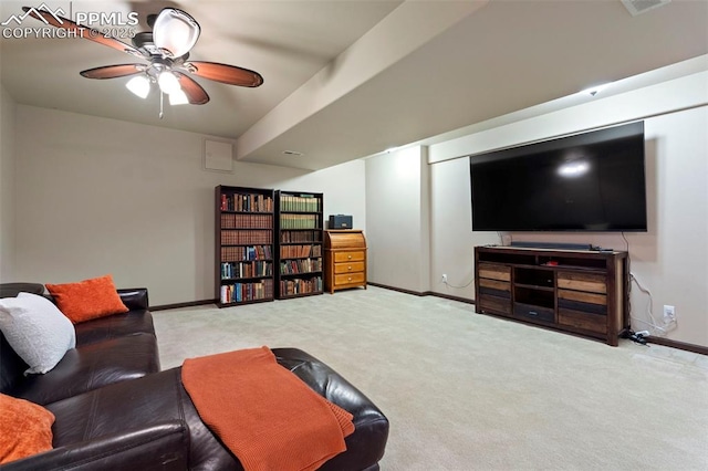 living room featuring baseboards, carpet, ceiling fan, and visible vents