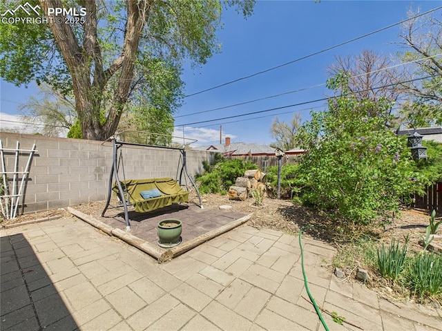view of patio featuring a fenced backyard