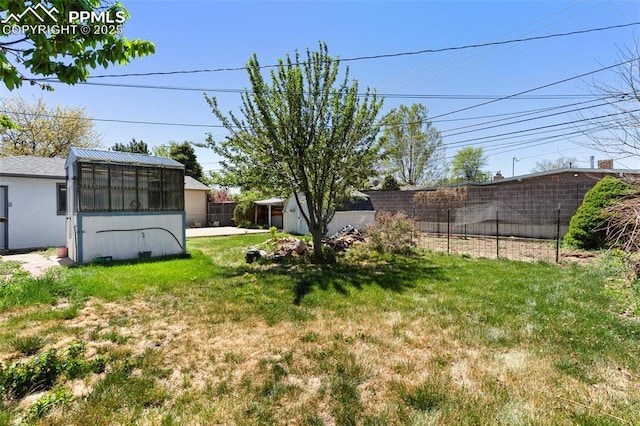view of yard featuring fence