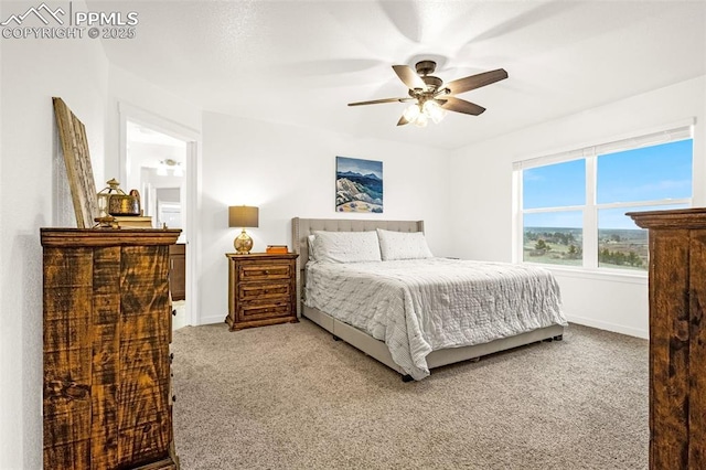 bedroom with carpet floors, baseboards, and ceiling fan