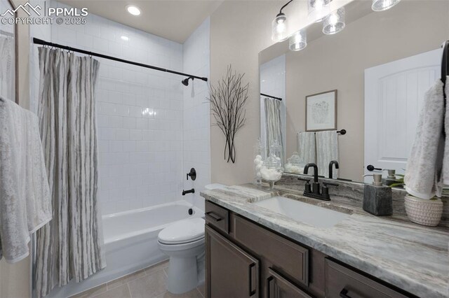 16990 Early Light Dr, Colorado Springs, CO 80908 - full bath featuring vanity, tile patterned floors, shower / bath combo, and toilet