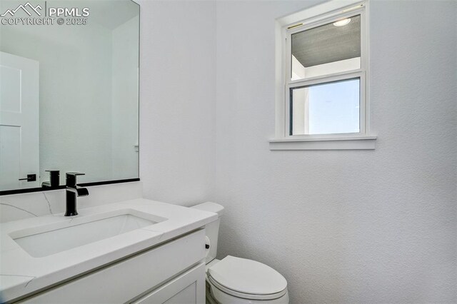 16990 Early Light Dr, Colorado Springs, CO 80908 - bathroom with vanity and toilet