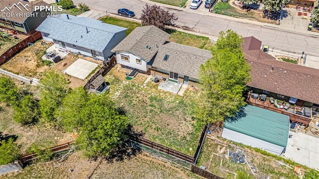 birds eye view of property with a residential view