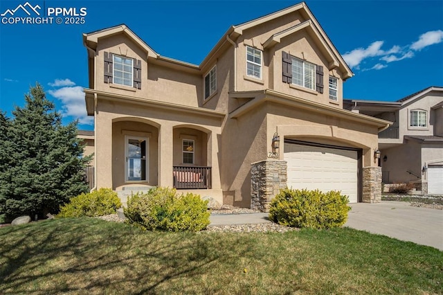 view of front of house featuring an attached garage, stucco siding, driveway, and a porch