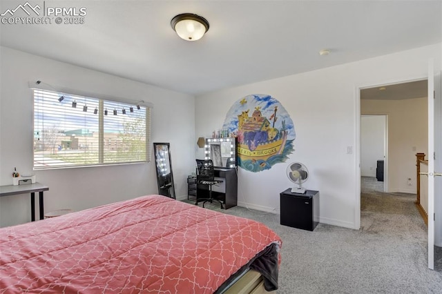 carpeted bedroom with baseboards