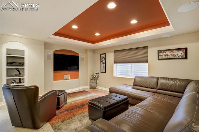 living room featuring tile patterned flooring, visible vents, baseboards, recessed lighting, and a raised ceiling