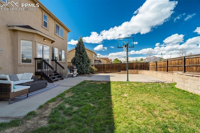 view of yard featuring a fenced backyard, outdoor lounge area, and a patio area