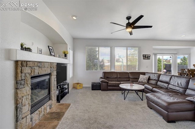 living room with ceiling fan, a fireplace, carpet floors, recessed lighting, and baseboards