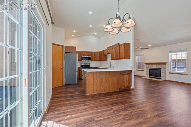 6151 Pine Hill Dr, Colorado Springs, CO 80918 - kitchen featuring a sink, stainless steel appliances, dark wood-style flooring, and open floor plan