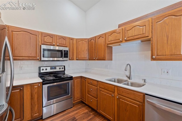 6151 Pine Hill Dr, Colorado Springs, CO 80918 - kitchen with a sink, appliances with stainless steel finishes, backsplash, and light countertops