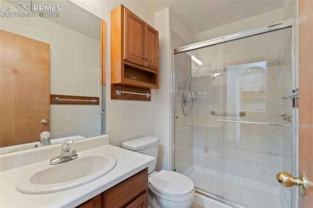 6151 Pine Hill Dr, Colorado Springs, CO 80918 - bathroom with toilet, a shower stall, and vanity