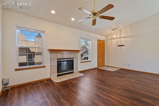 6151 Pine Hill Dr, Colorado Springs, CO 80918 - unfurnished living room with ceiling fan, recessed lighting, baseboards, wood finished floors, and a tile fireplace