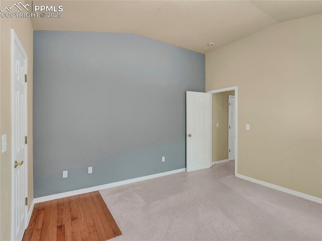 2174 Alpine Shadows Vw, Colorado Springs, CO 80919 - spare room with vaulted ceiling and baseboards