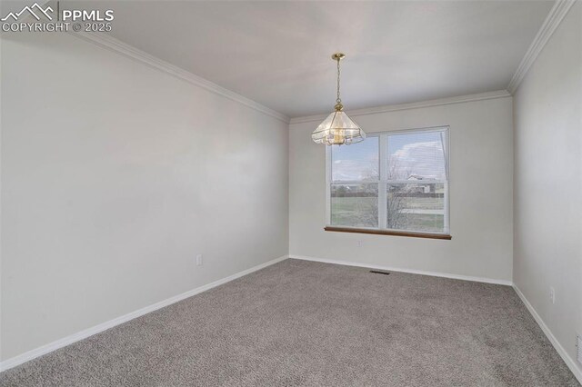 7884 Gladwater Rd, Peyton, CO 80831 - spare room with carpet floors, a chandelier, and ornamental molding