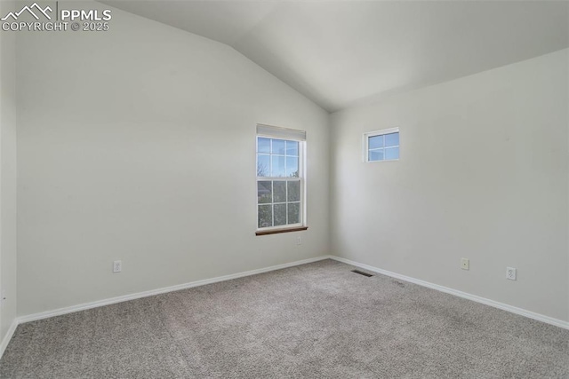 7884 Gladwater Rd, Peyton, CO 80831 - unfurnished room featuring baseboards, vaulted ceiling, carpet flooring, and visible vents
