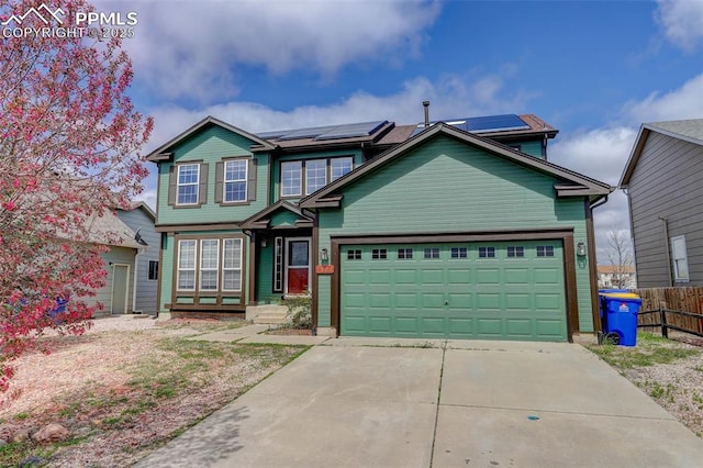 7884 Gladwater Rd, Peyton, CO 80831 - view of front facade featuring concrete driveway, fence, and solar panels