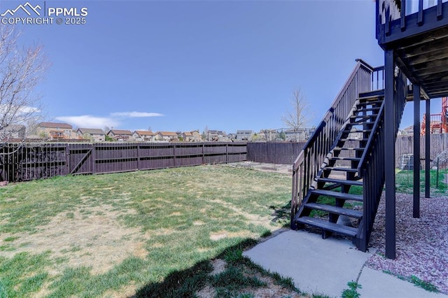 7884 Gladwater Rd, Peyton, CO 80831 - view of yard featuring stairs and a fenced backyard